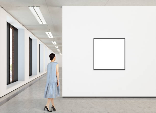 istock Woman looking at blank poster in modern gallery 846015086