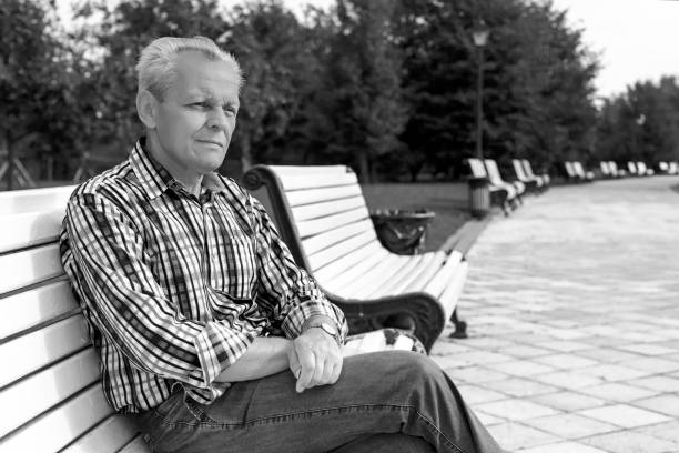 istock elderly sad man in a park 846015382