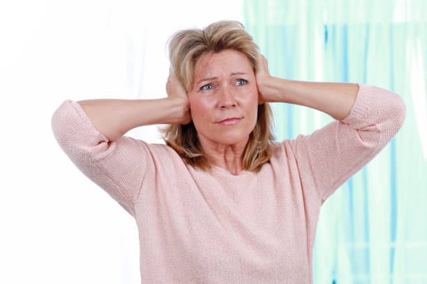 istock Woman shut her ears from noise 846022126