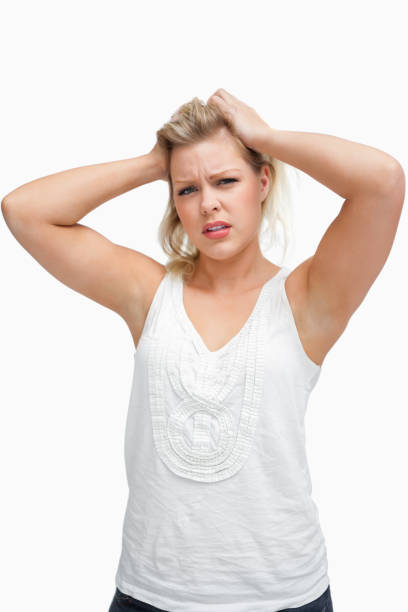 istock Upset woman frowning while placing her hands on her head 846026162