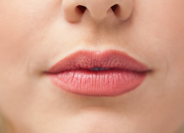 istock Close up of lips with lipstick on them 846028432