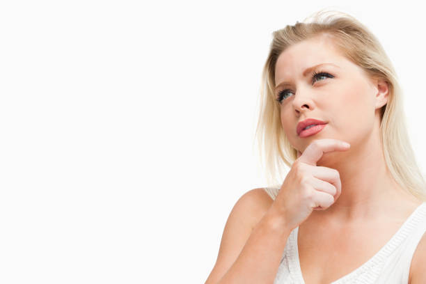 istock Attractive blonde woman lost in thoughts 846029078