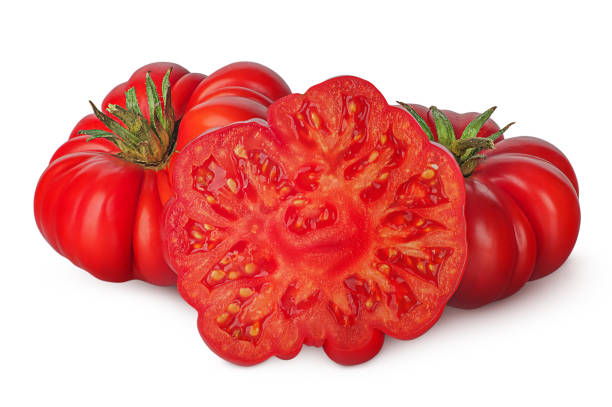 istock Whole and part of heirloom tomatoes 846032924