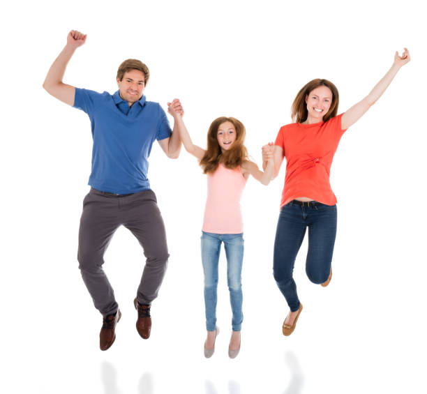istock Happy Family Jumping Together 846040760