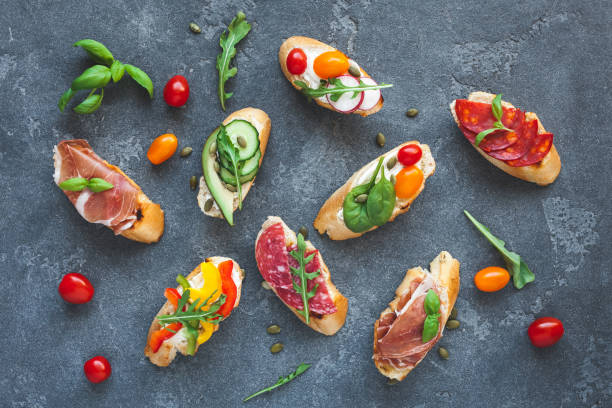 istock Traditional spanish tapas on dark background. Flat lay, top view 846047170