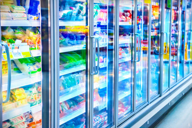 Refrigerator in the supermarket Refrigerator in the supermarket frozen food stock pictures, royalty-free photos & images