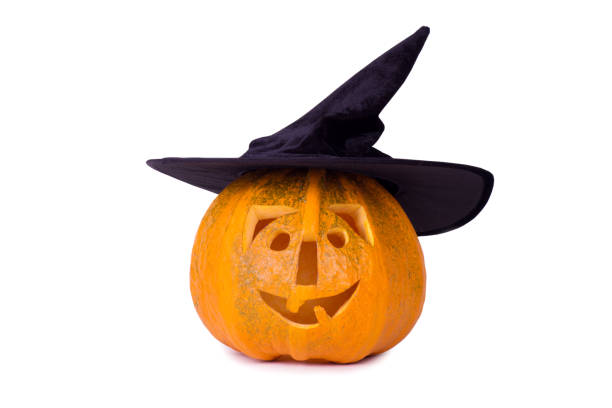 istock Halloween pumpkin, funny face in hat, isolated on white background 846061778