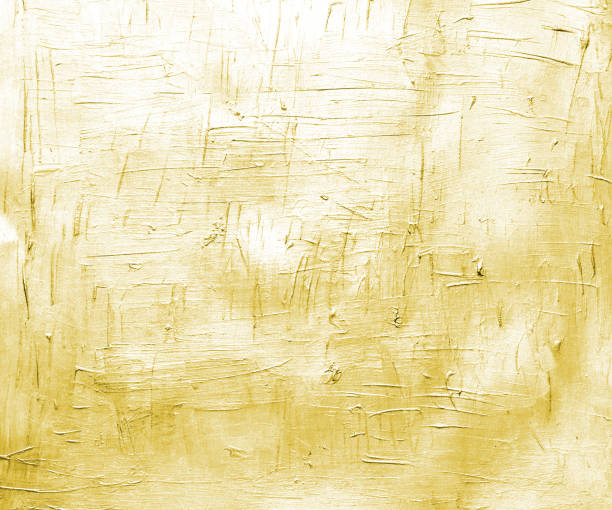 istock Warm yellow painted canvas with brush strokes. Metallic effect background for card or banner template 846061988