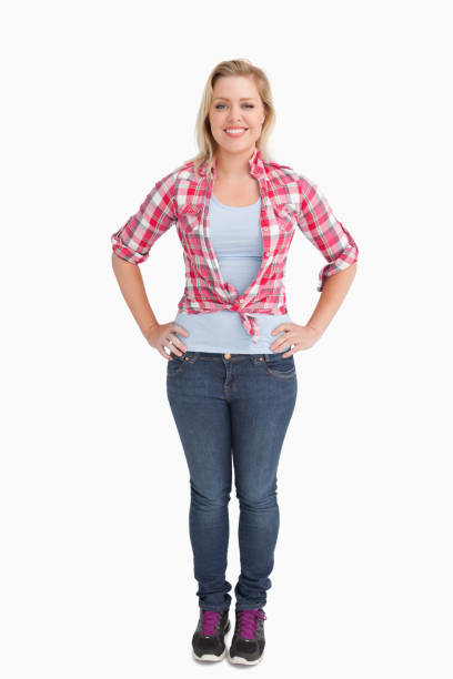 istock Happy young woman placing her hand on her hips 846068044