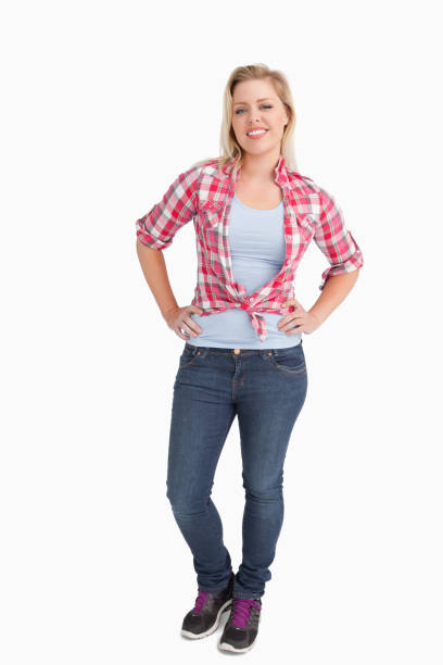 istock Happy blonde woman standing with her hands on her hips 846068074