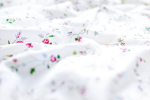 wrinkled white and floral bed sheets background - cotton smooth green plant imagens e fotografias de stock