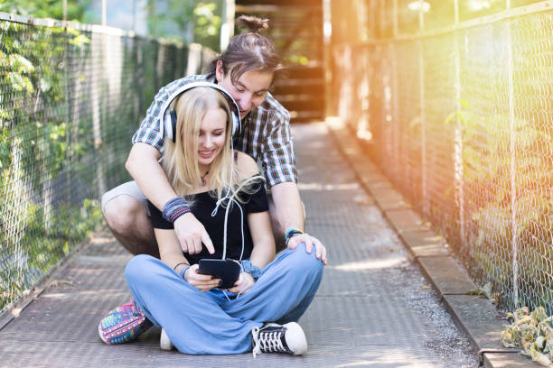 istock Young couple having fun with social media on digital tablet 846075064