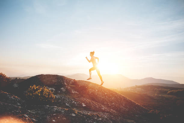 istock Woman athlete doing sport outdoors at sunset 846077932