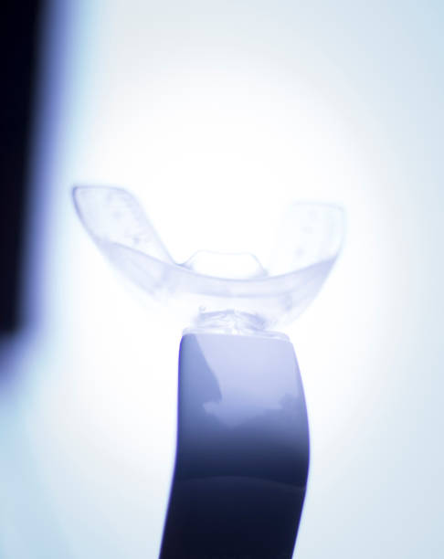 istock Teeth invisible brackets orthodontic dental tooth vibrator to accelerate orthodontics alignment straightening dentist treatment. 846087890