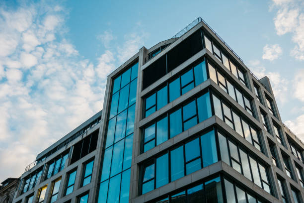 istock modern office building with big blue windows 846088034