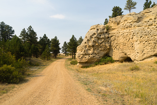 The gravel road through Medicine Rocks in Montana USA
