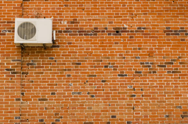 istock Air conditioning on a background of old brick wall 846095436