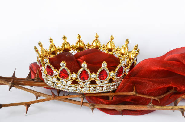 A beautiful crown with red jewels on thorny twigs with red cloth symbols from Christanity Good Friday