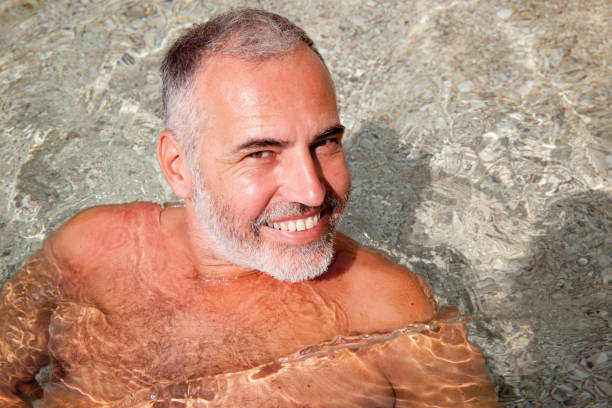istock Man On Beach Holiday Relaxing In The Sea 846113294