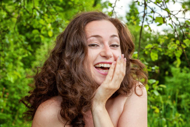 istock A girl is smiling at the park background 846124436