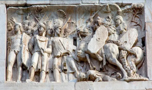 Roman Legionnaires Military Battle Arch of Constantine Rome Italy Arch built in 315 AD to celebrate Emperor Constantine's victory in 312 over co-emperor Maxenntius.  Constantine attributed victory to vision of Jesus Christ, made Christianity legal