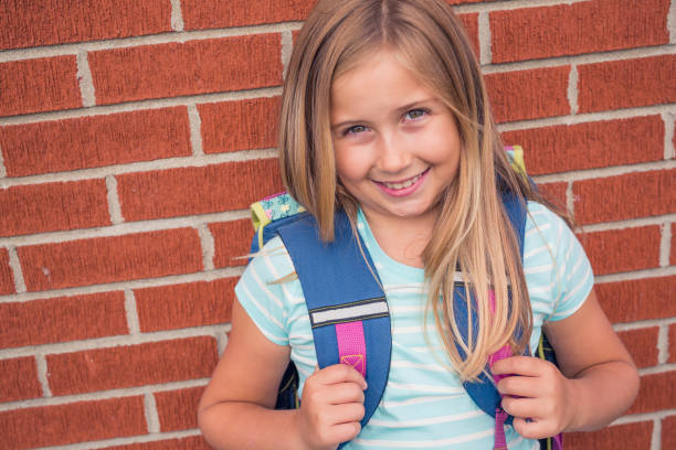 istock nine years old girl student at school 846141790