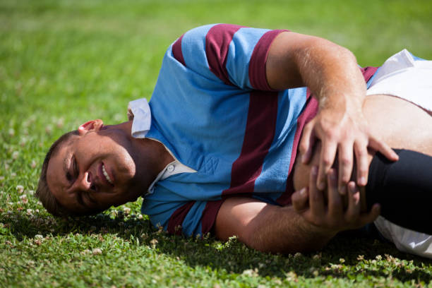 istock Injuerd young rugby player lying on field 846145038