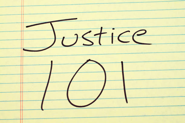 istock Justice 101 On A Yellow Legal Pad 846147564