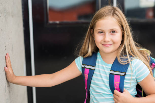 istock nine years old girl student at school 846148662