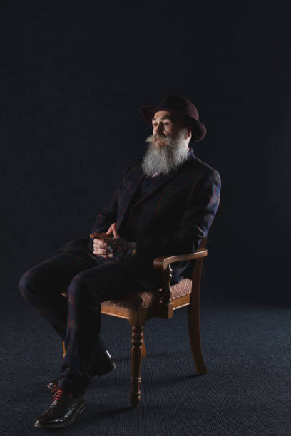 istock Bearded gentleman in his 50s with tattooed hands 846152062