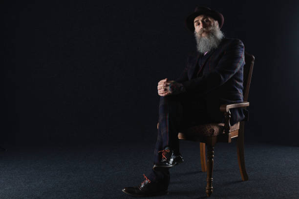 istock Bearded gentleman in his 50s with tattooed hands 846152104
