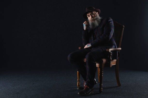 istock Bearded gentleman in his 50s with tattooed hands 846152142