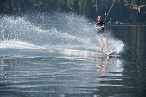 istock Beautiful woman waterskiing 846158690