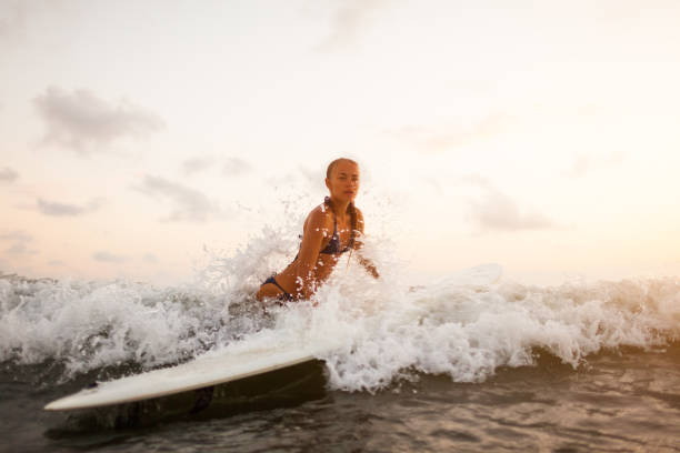 istock young surfer woman 846158766