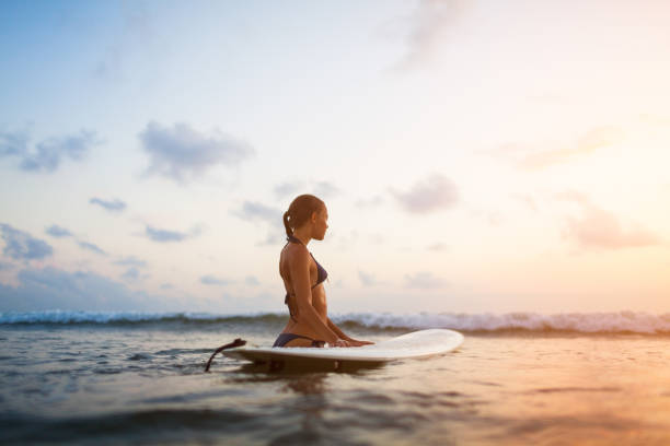 istock young surfer woman 846158772