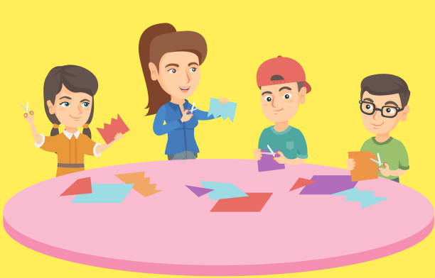 Teacher and children cutting paper with scissors Young caucasian teacher and preschoolers using scissors to make decoration from colorful paper. Children cutting paper with scissors in preschool. Vector sketch cartoon illustration. Square layout. craft activities for preschoolers stock illustrations
