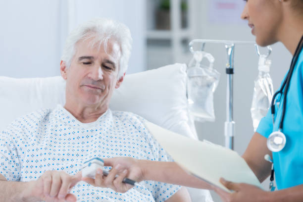 istock Hospital nurse checks patient's oxygen level 846171384