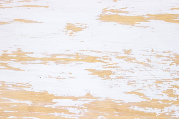 Varnished Wooden Background with white messy paint.