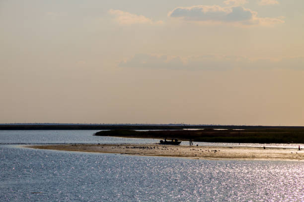 istock Motorboat with fishermen sailing at strait 846181788