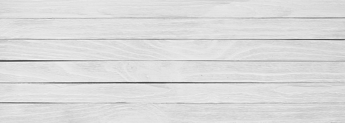 White wood texture close-up, background of a wooden table surface, panorama