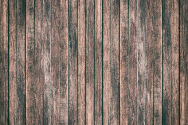 istock Vintage surface wood table and rustic grain texture background. Close up of dark rustic wall made of old wood table planks texture. Rustic brown wood table texture background template for your design. 846185734