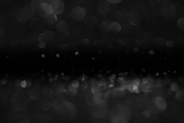 istock bokeh of water fly and lights on black background 846185824