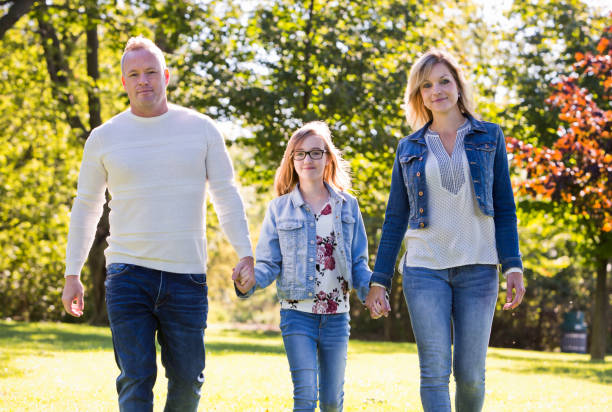 istock casual young family in the park 846192562