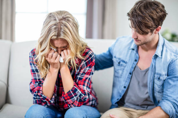 istock Boyfriend comforting sad girlfriend 846208292