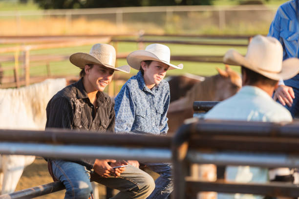 istock Group of Young Cowboys Waiting and Watching at a Rodeo 846211182