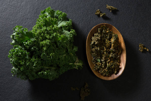 istock Mustard greens on black background 846214218