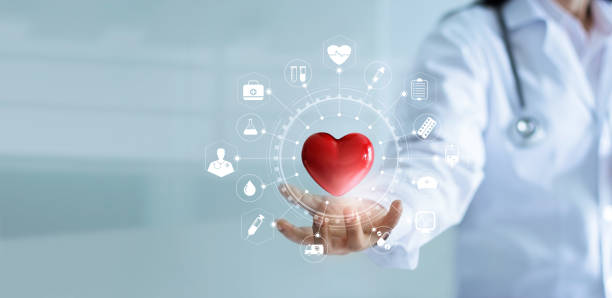 Medicine doctor holding red heart shape in hand with medical icon network connection modern virtual screen interface, service mind and medical technology network concept Medicine doctor holding red heart shape in hand with medical icon network connection modern virtual screen interface, service mind and medical technology network concept doctors bag stock pictures, royalty-free photos & images