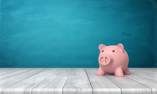 3d rendering of a pink piggy bank in front view standing on a wooden table. Domestic budget. Saving money. Family finances.