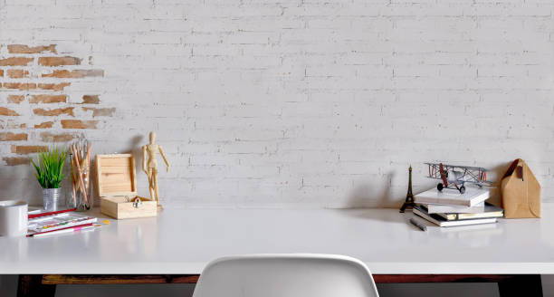 istock Work space Mock up white tabletop with Craft tools, pencils and houseplant. white wood desk with copy space for products display montage. 846224736