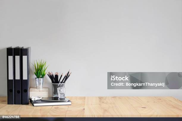 Work Space Mock Up White Tabletop With Files Pencils And Houseplant Wood Desk With Copy Space For Products Display Montage Stock Photo - Download Image Now